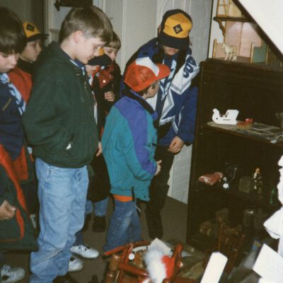 Bear Cub Scouts looking at the toys that kids played with years ago