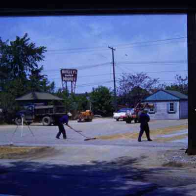 Lents parking lot after tearing down house to west of building. 1959