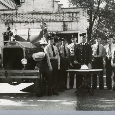 Firefighters and Old Betsy at Old Village Hall fire station