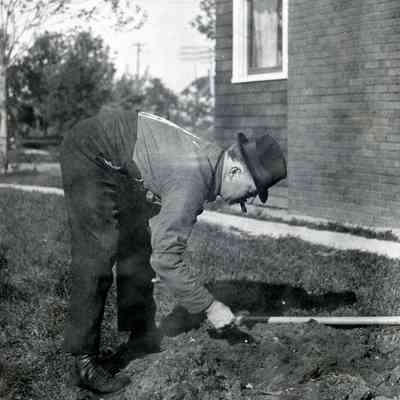 A man gardening.