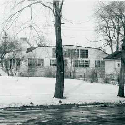 Back of A.S. Pooles Garage at center. Empty lot in front is 35410 Park