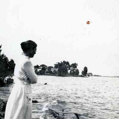 A women by the lake.