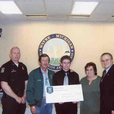 Chief Williams, Brandon Tesner and family, Mayor Al