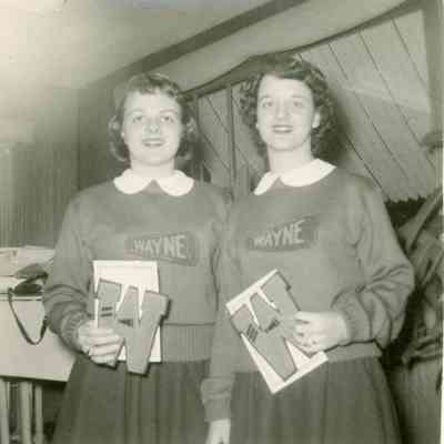 Marilyn Johnson and Barb Apple at the Cheer Banquet at Barbus's on March 11, 1954.