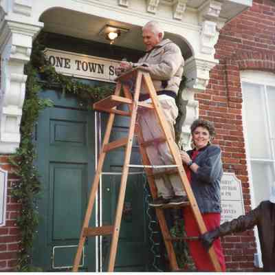 Garden Club Members Decorating Museum for Christmas