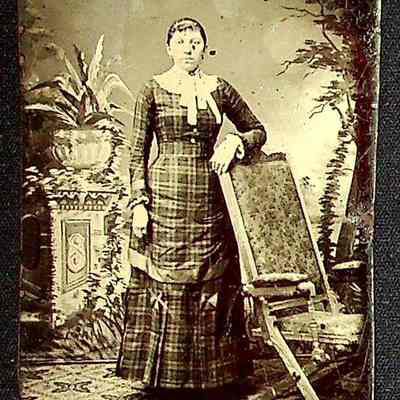 Unknown Woman Posed with Chair, undated