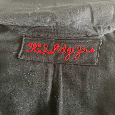 Hand stitched name on back of jumper