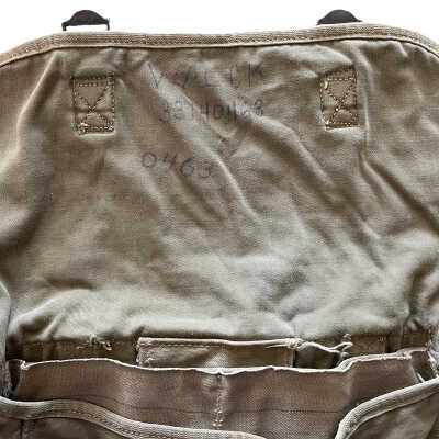 Name and ASN handwritten on inside flap