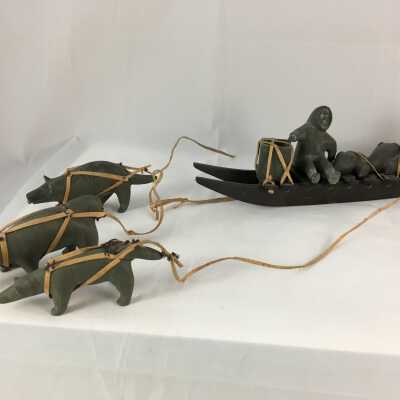 Dog Sled with Seal Hunter and Dogs
