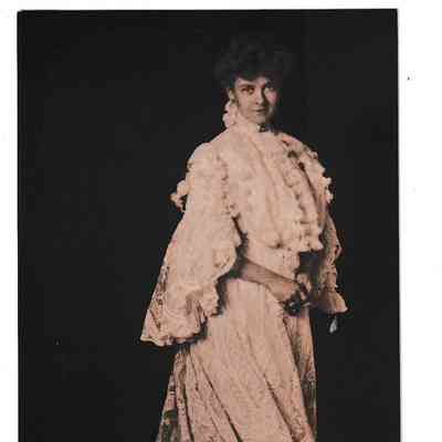 Photo - Woman in long white dress