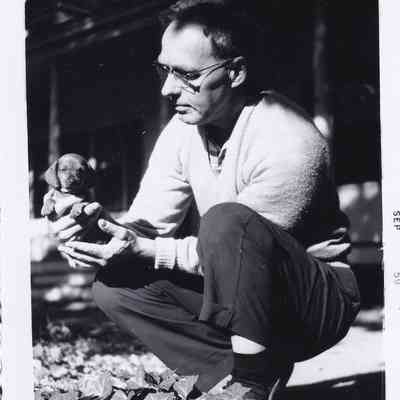 Photograph of Man and Dog