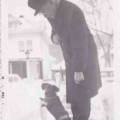 Photograph of Man and Dog
