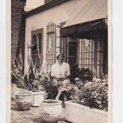 Photo - Woman sitting outside