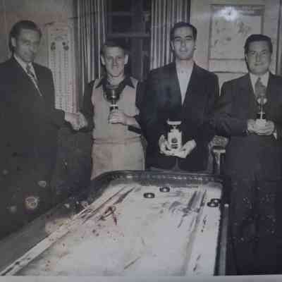Picture of Steve Barbiarz(right) taking a picture with an executive baseball spokesperson(left)