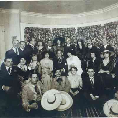 Photo of Edward Bernays with various members of the Metropolitan Opera. At center is Enrico Caruso.