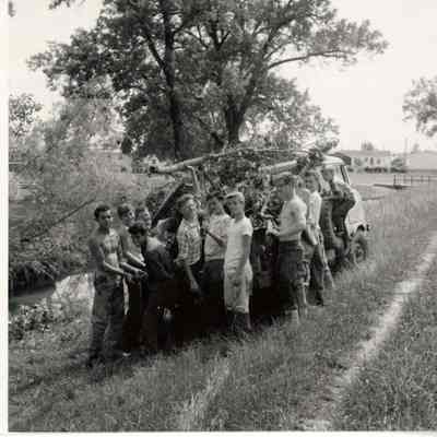 Young Boys Cleaning Buffalo Creek