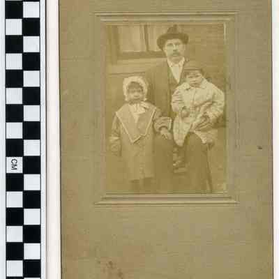 Man with two children