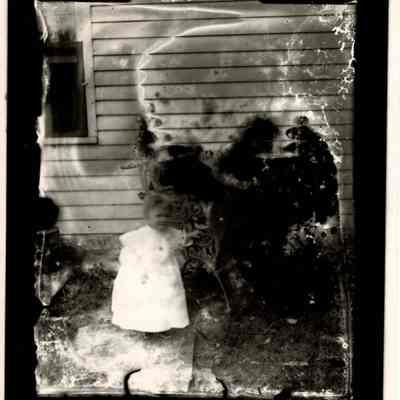 Child Outside Schmidt House