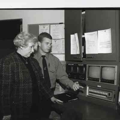 President and Officer touring Computers
