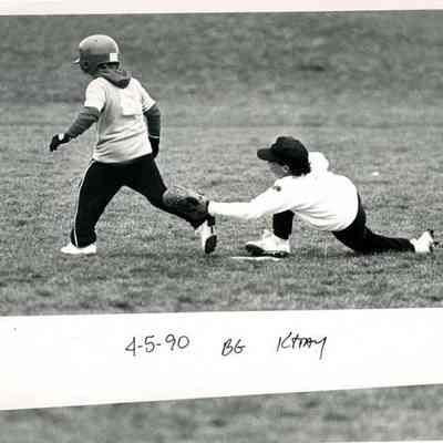 Michael Mnookin, 9, tries to tag runner as he rounds second base