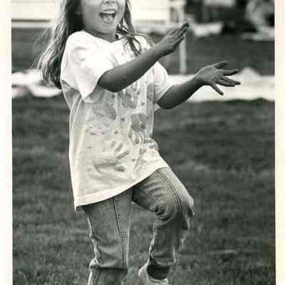 Heather Burgess, 5, Wheeling, gets down to the southern beat