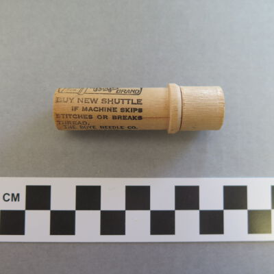Continued text on side of case.: Origsize: 2.5" (h) x 0.75" (di; Origformat: Artifact