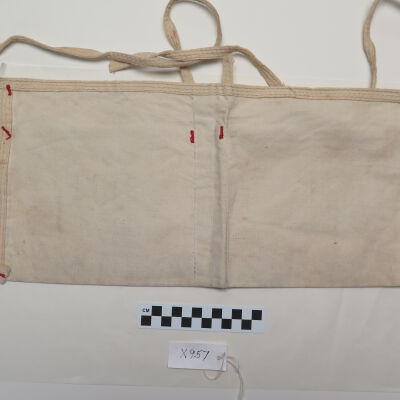 Back of apron.: Origsize: 8" (w) x 17" (l); Origformat: Artifact