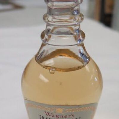 Front of bottle showing label: Origsize: 3.75" (h) x 1" (dia); Origformat: Artifact