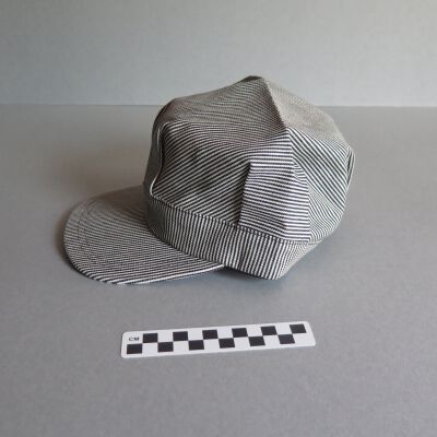 Side of hat.: Origsize: 5" (h) x 9.5" (w) x; Origformat: Artifact