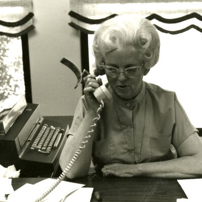 Lucy Brown on phone.