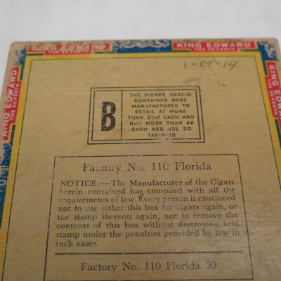Bottom of cigar box.: Origsize: 2" (h) x 4.75" (w) x; Origformat: Artifact