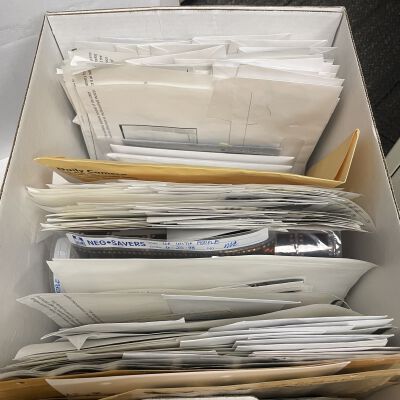Two Boxes of Daily Camera photos, negatives, & news clippings