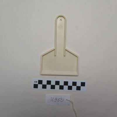 Back of ice scraper.: Origsize: 4" (w) x 5.5" (l); Origformat: Artifact