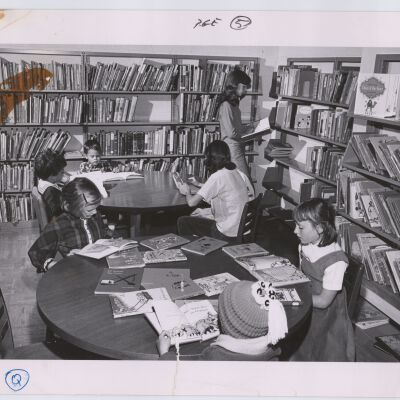 Children reading in Mamie Doud Eisenhower Library, 12 Garden Center location