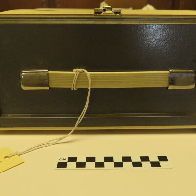 Projector Handle.: Origsize: 5.25" (h) x 11" (w); Origformat: Artifact