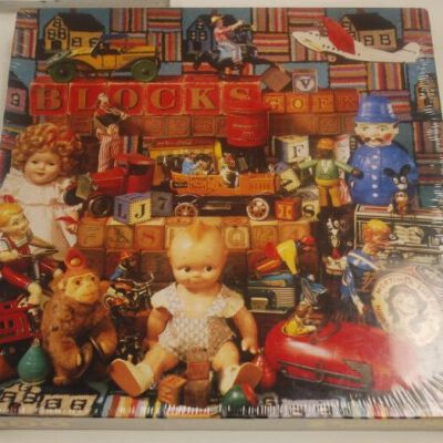 Front of puzzle box: Origsize: 1.5" (h) x 11.5" (w); Origformat: Artifact