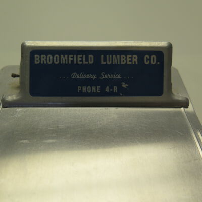 Close up of text on front of clipboard.: Origsize: 4.5" (w) x 7" (l); Origformat: Artifact