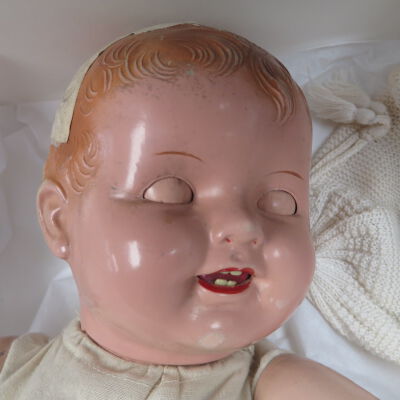Doll face: Origsize: 14" (w) x 25" (l); Origformat: Artifact