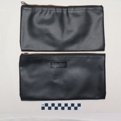 Back of money bags.: Origsize: 10" (w) x 5.5" (l); Origformat: Artifact
