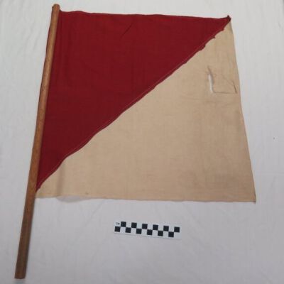 Flag: Origsize: 5.5" (w) x 26.5" (l); Origformat: Artifact