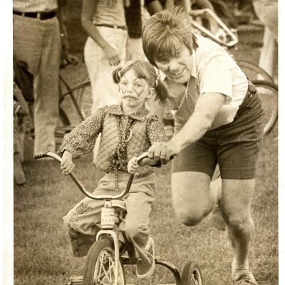 "Wild Ride" June 1976 - Girl with face paint - on tricycle with adult pushing