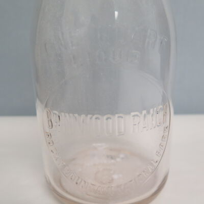 Close up of text on bottle.: Origsize: 10" (h) x 3.5" (dia); Origformat: Artifact