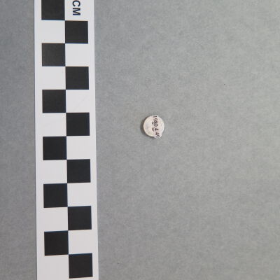 Back of button.: Origsize: .25" (diam); Origformat: Artifact