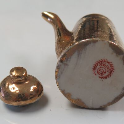Bottom of miniature: Origsize: 2.5" (h) x 2.25" (w); Origformat: Artifact