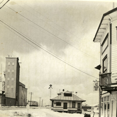 Broomfield train depot by grain elevators and Jone's Hall