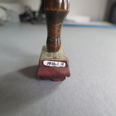 Number on stamp.: Origsize: 3" (h) x 2" (w) x 1"; Origformat: Artifact