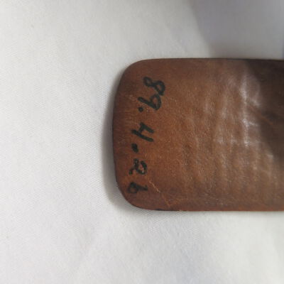 Close up of number on belt.: Origsize: 1.25" (w) x 41" (l).; Origformat: Artifact
