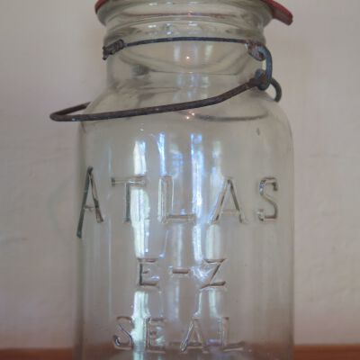 Side of jar on exhibit.: Origsize: 7.25" (h) x 4" (diam; Origformat: Artifact