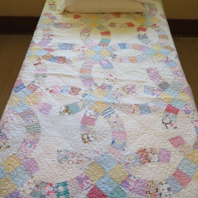 Quilt on bed.: Origformat: Artifact