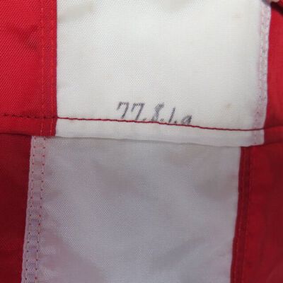 Close up of number on flag.: Origformat: Artifact